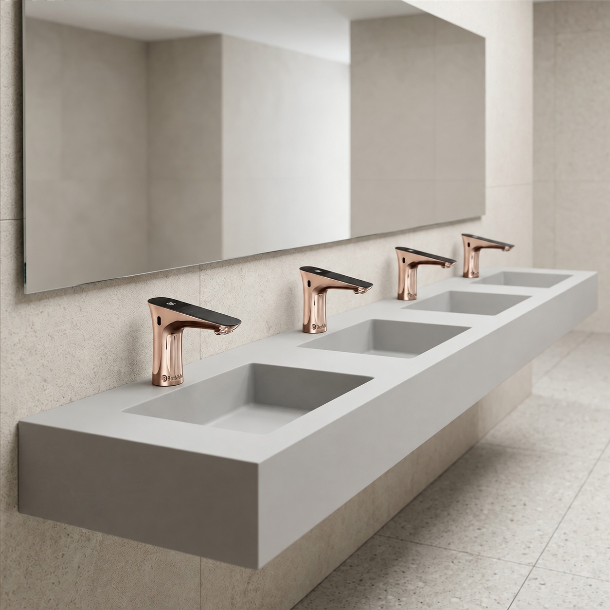 Four rose gold touchless bathroom sensor faucets above rectangular basins