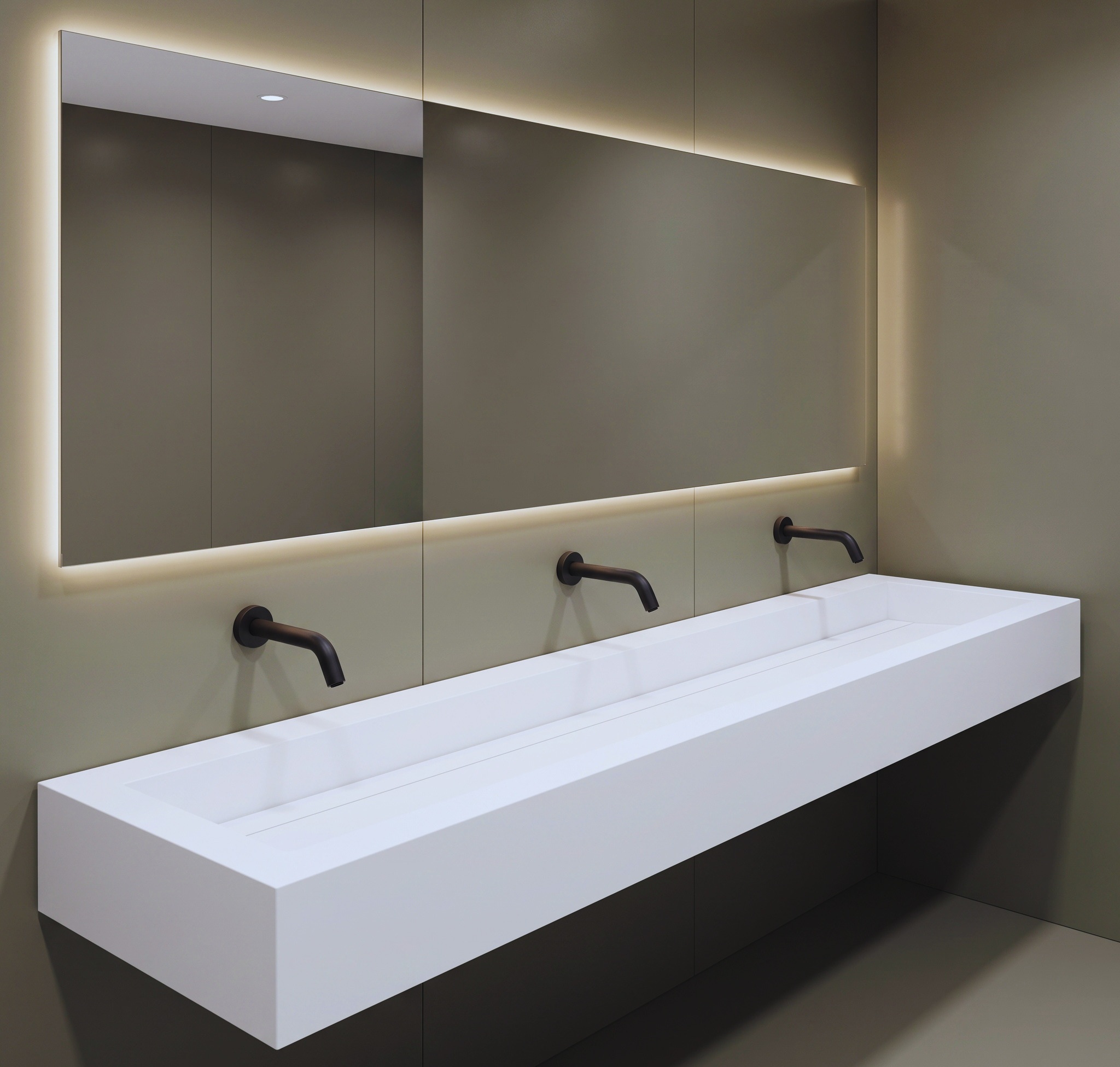 Hotel public restroom touchless fixtures