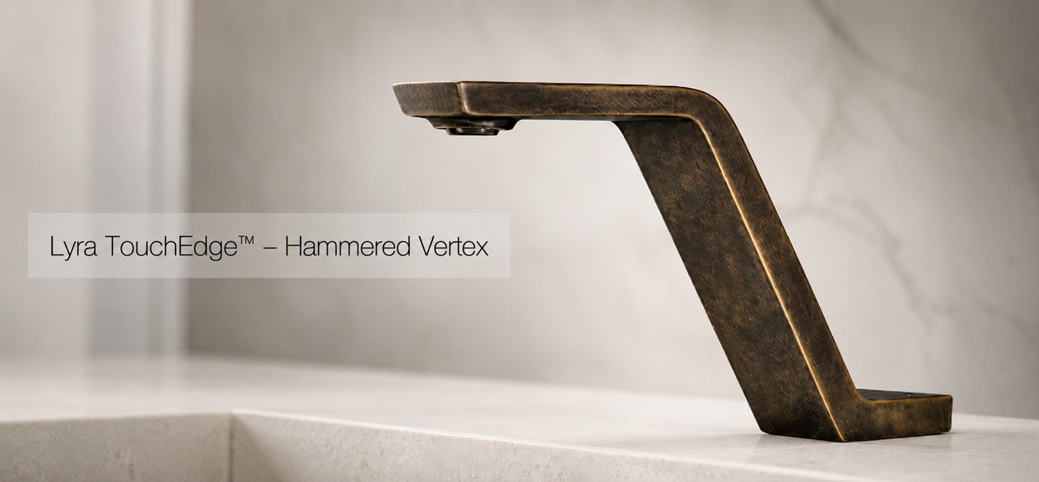 Lyra TouchEdge Hammered Vertex angular hammered bronze faucet on a clean stone countertop with a subtle blurred bathroom background